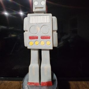 Vintage wooden carved robot.  I bought it at an estate barn sale.
